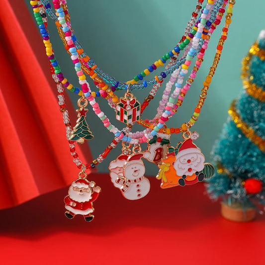 Kerst ketting set met kerstboom, kerstman en sneeuwpop hangers – feestelijke sieraden - 7 stuks