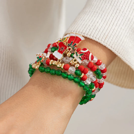 Kerst armbanden set met sneeuwvlok en bel hanger kralen