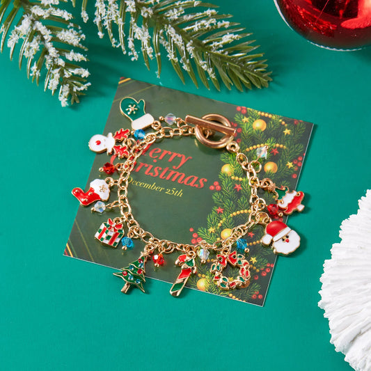 Kerst armband met kerstman sneeuwpop ster en kerstboom hanger