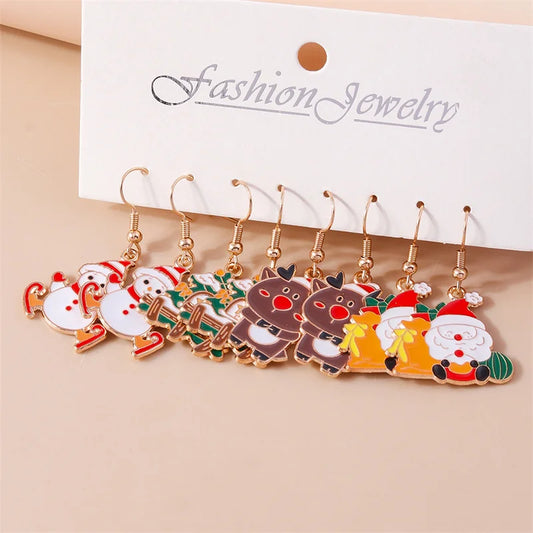 Kerst oorbellen met kerstman, rendier en sneeuwpop hangers