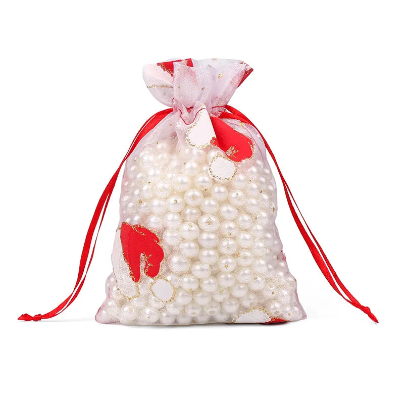 Kerst cadeau verpakking – Luxe organza zakjes met goudopdruk en trekkoord