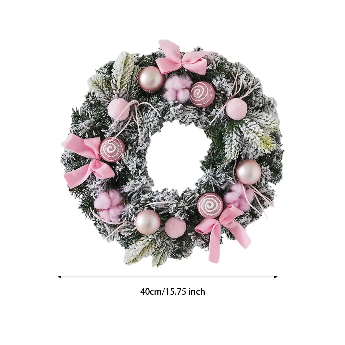 Kerst krans met roze strik – stijlvolle winterdecoratie voor deur en muur