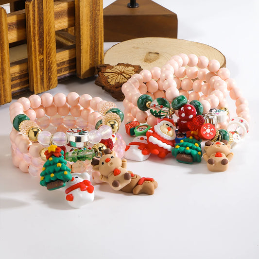 Kerst armbanden set met kralen, kerstman en sneeuwpop bedels