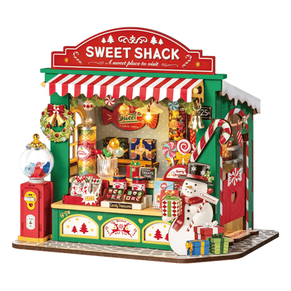 Zelfbouw miniatuur huisje met kersthaard – knus wintertafereel