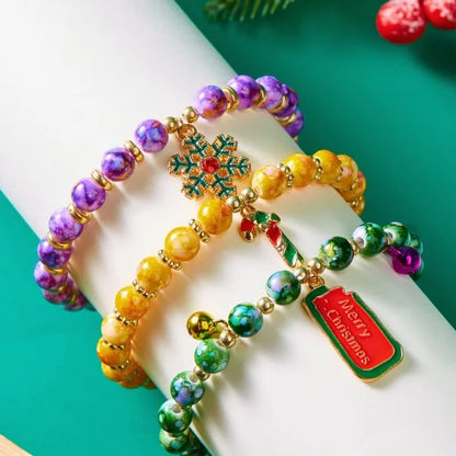 Kerst armband met kerstman sneeuwpop ster en kerstboom hanger