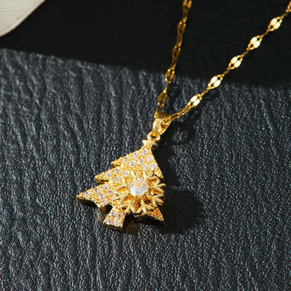 Kerst ketting met fonkelende sneeuwvlok en kerstboom hanger vol zirkonia