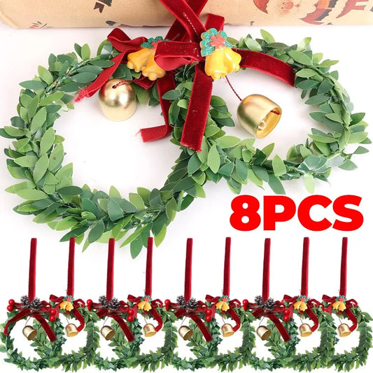 Kerst krans met bel, kunstgroen en fluwelen strik voor deur of haard