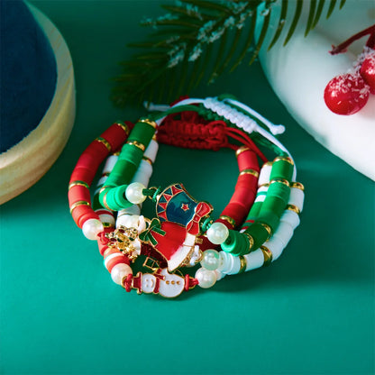 Kerst armband set met kerstboom rendier en kerstman kralen (4 stuks)