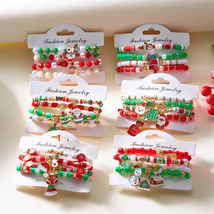 Kerst armband set met kerstboom rendier en kerstman kralen (4 stuks)
