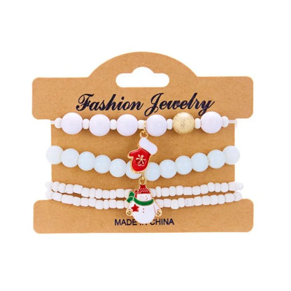 Kerst armband met kerstman sneeuwpop ster en kerstboom hanger