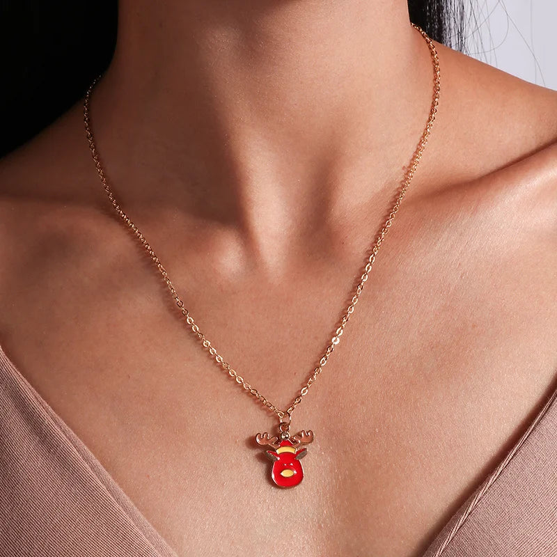 Kerst ketting met kerstboom, kerstman en belletjes hanger – feestelijke sieraden voor dames