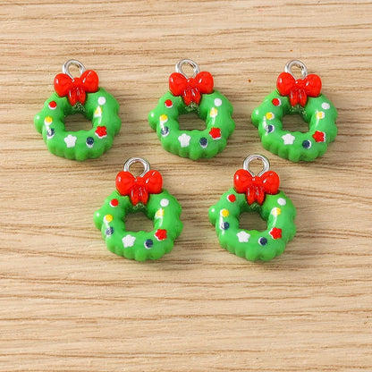 Kersthangers voor ketting of armband – 10 schattige hars bedels met kerstman en rendier