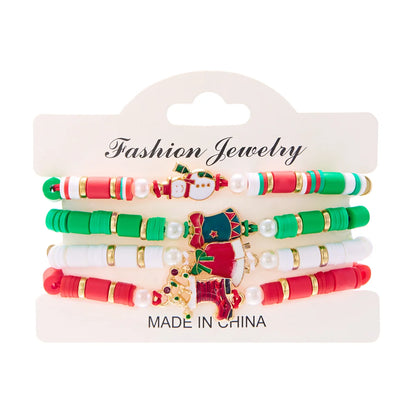 Kerst armband set met kerstboom rendier en kerstman kralen (4 stuks)