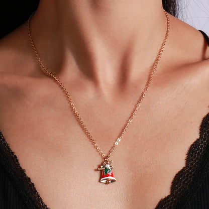 Kerst ketting met kerstboom, kerstman en belletjes hanger – feestelijke sieraden voor dames