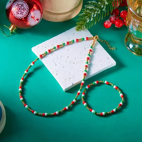Kerst armband met kerstman sneeuwpop ster en kerstboom hanger