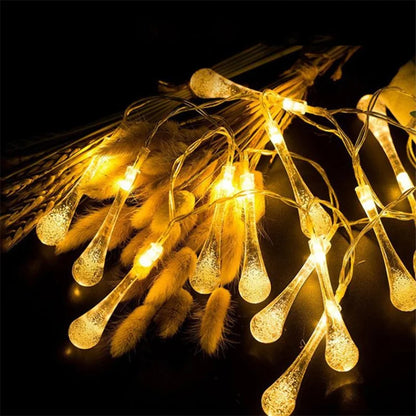 Verlichte Kerst slinger druppelvorm LED lichtjes voor sfeervolle decoratie