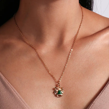 Kerst ketting met kerstboom, kerstman en belletjes hanger – feestelijke sieraden voor dames