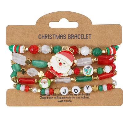 Kerst armband set met kerstboom rendier en kerstman kralen (4 stuks)