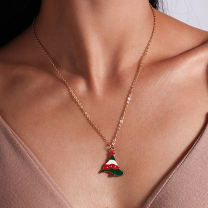 Kerst ketting met kerstboom, kerstman en belletjes hanger – feestelijke sieraden voor dames
