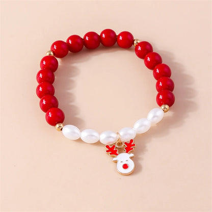 Kerst armband met kralen, rendier en kerstboom bedels voor dames