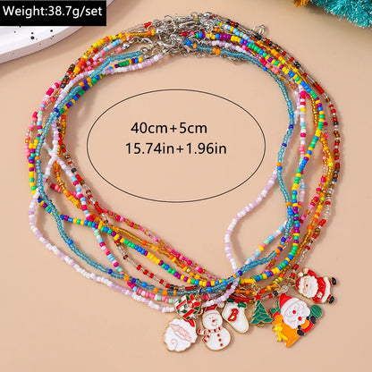 Kerst ketting set met kerstboom, kerstman en sneeuwpop hangers – feestelijke sieraden - 7 stuks