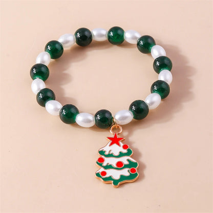 Kerst armband met kralen, rendier en kerstboom bedels voor dames