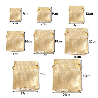 Kerst cadeau verpakking – Luxe goud en zilver geschenkzakjes met trekkoord