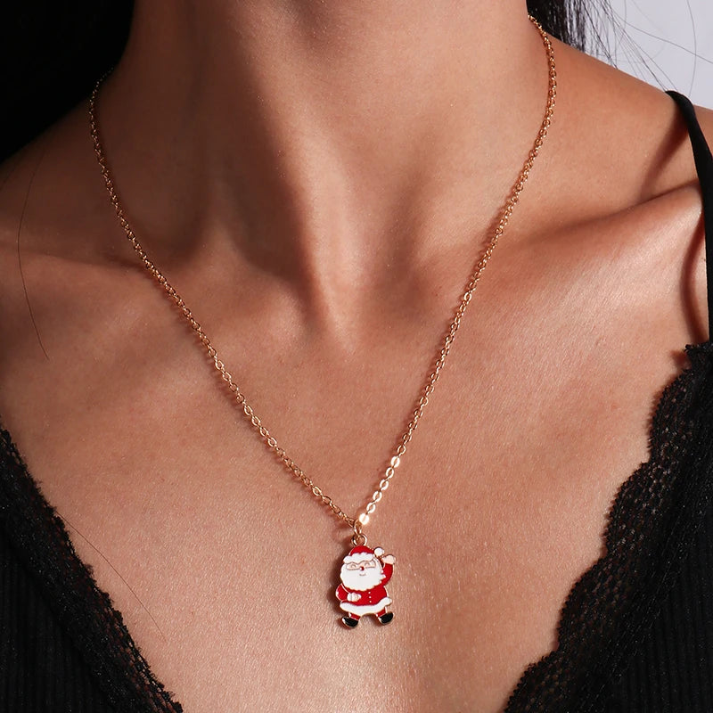 Kerst ketting met kerstboom, kerstman en belletjes hanger – feestelijke sieraden voor dames