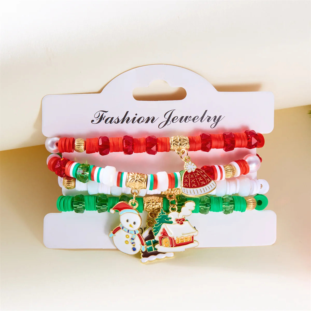 Kerst armband set met kerstboom rendier en kerstman kralen (4 stuks)