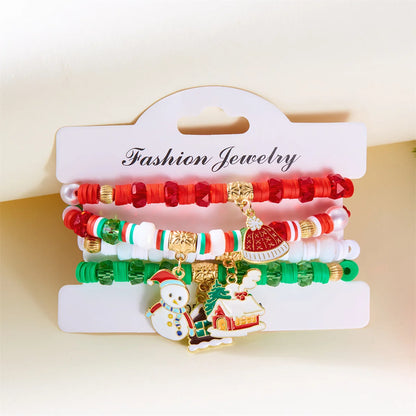 Kerst armband set met kerstboom rendier en kerstman kralen (4 stuks)
