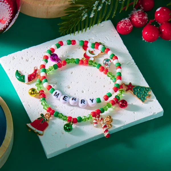Kerst armband met kerstman sneeuwpop ster en kerstboom hanger