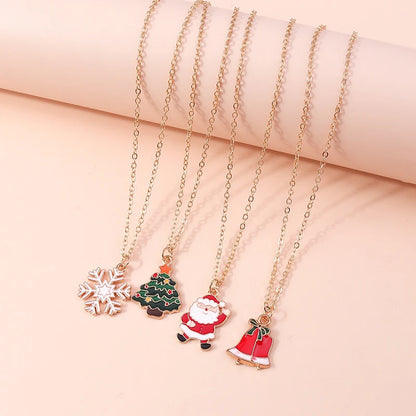 Kerst ketting met kerstboom, kerstman en belletjes hanger – feestelijke sieraden voor dames