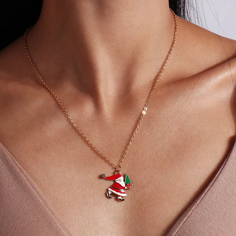 Kerst ketting met kerstboom, kerstman en belletjes hanger – feestelijke sieraden voor dames