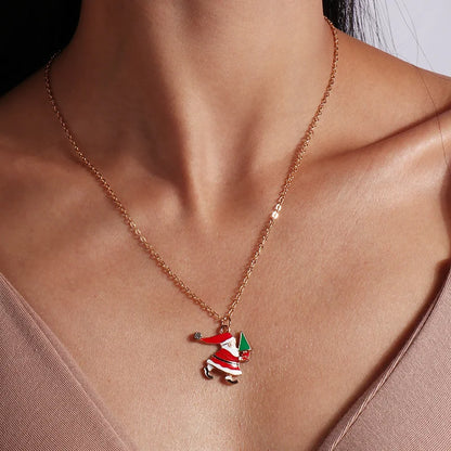 Kerst ketting met kerstboom, kerstman en belletjes hanger – feestelijke sieraden voor dames
