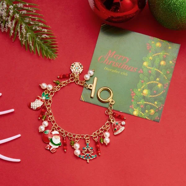 Kerst armband met kerstman sneeuwpop ster en kerstboom hanger