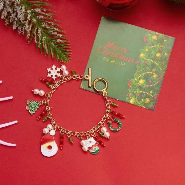 Kerst armband met kerstman sneeuwpop ster en kerstboom hanger