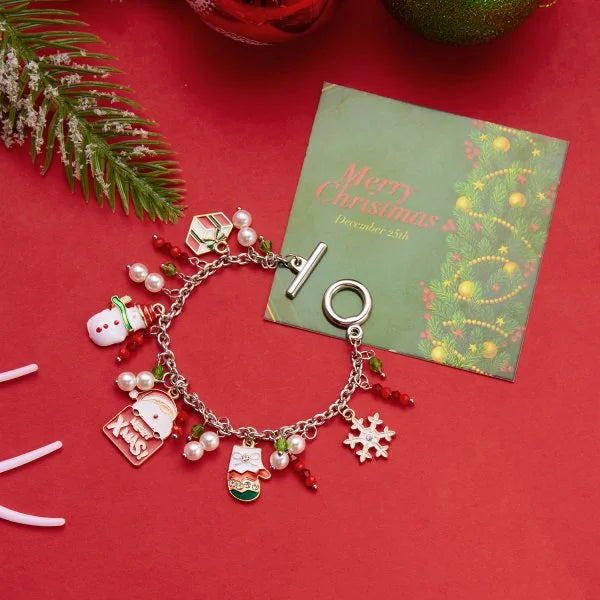 Kerst armband met kerstman sneeuwpop ster en kerstboom hanger