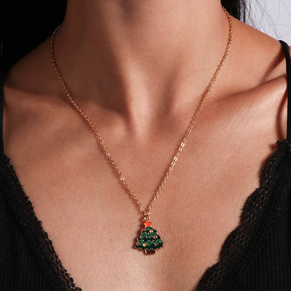 Kerst ketting met kerstboom, kerstman en belletjes hanger – feestelijke sieraden voor dames