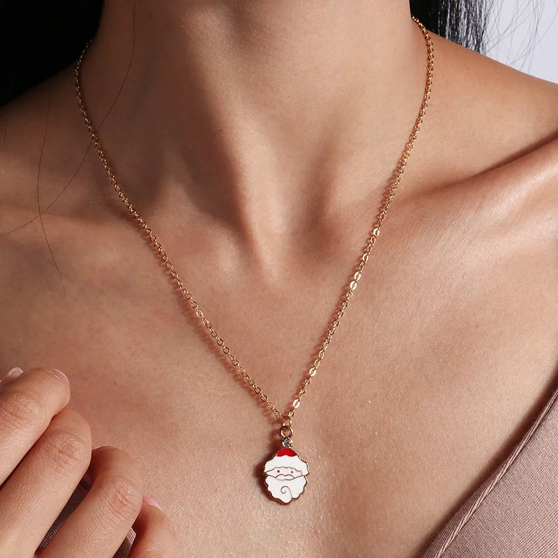 Kerst ketting met kerstboom, kerstman en belletjes hanger – feestelijke sieraden voor dames