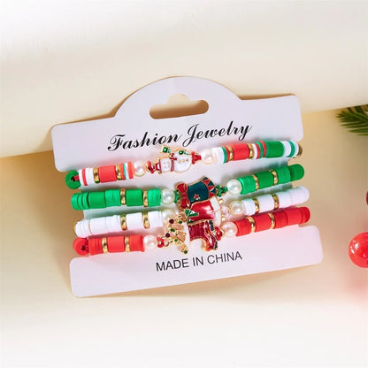Kerst armband set met kerstboom rendier en kerstman kralen (4 stuks)