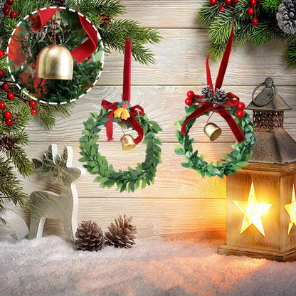 Kerst krans met bel, kunstgroen en fluwelen strik voor deur of haard