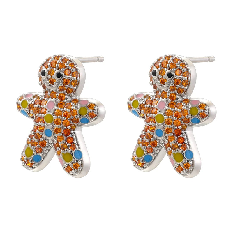 Kerst oorbellen goudkleurige candy & gingerbread man met fonkelende zirkonia