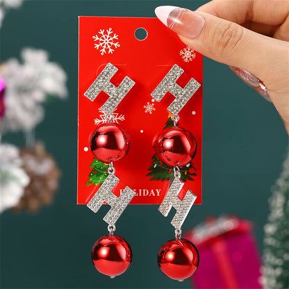 Kerst oorbellen met speelse belletjes en fonkelende details – diverse varianten