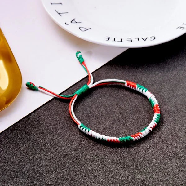 Kerst armband met kerstman sneeuwpop ster en kerstboom hanger