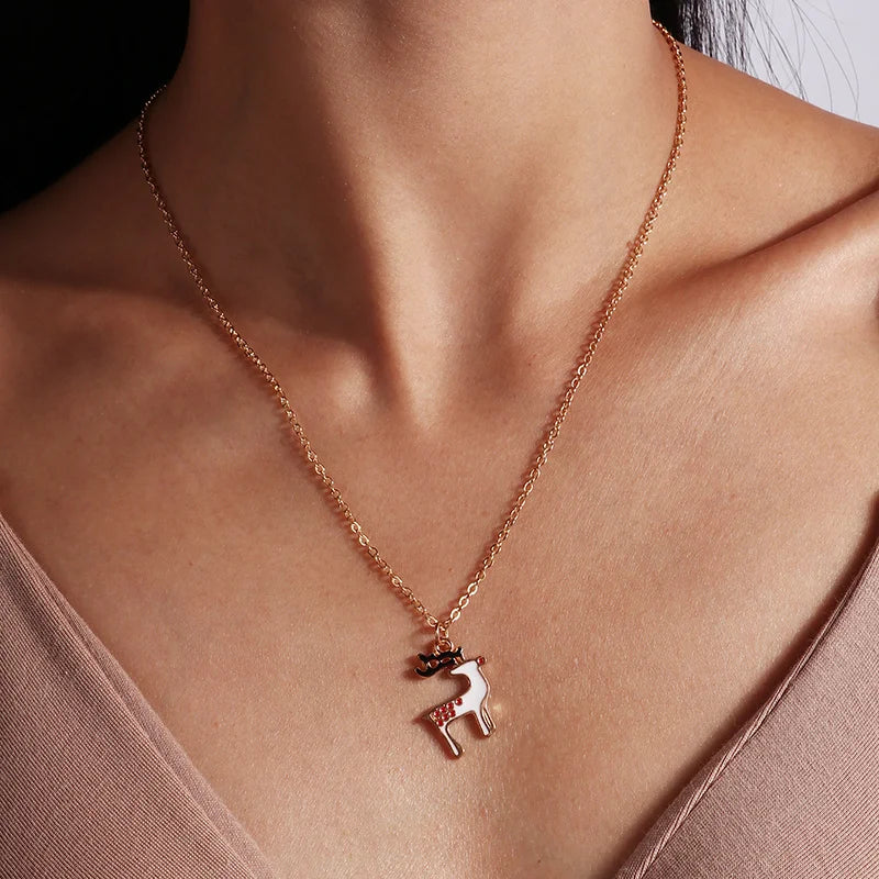 Kerst ketting met kerstboom, kerstman en belletjes hanger – feestelijke sieraden voor dames