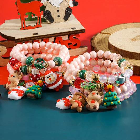 Kerst armbanden set met kralen, kerstman en sneeuwpop bedels