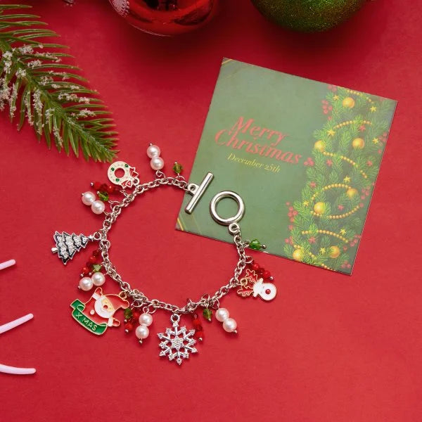 Kerst armband met kerstman sneeuwpop ster en kerstboom hanger