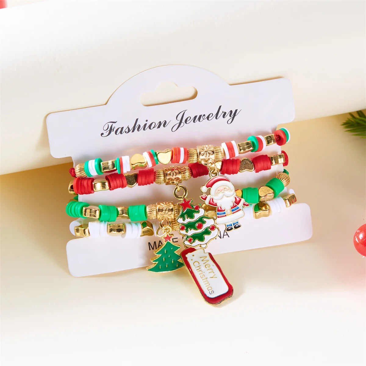 Kerst armband set met kerstboom rendier en kerstman kralen (4 stuks)