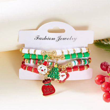 Kerst armband set met kerstboom rendier en kerstman kralen (4 stuks)