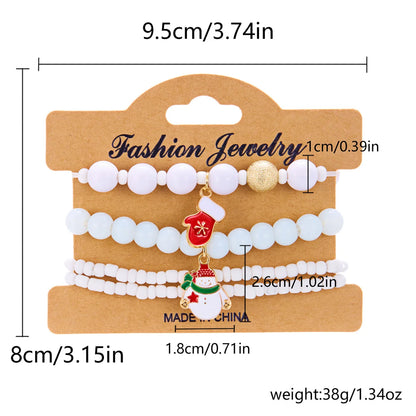Kerst armband set met kerstboom rendier en kerstman kralen (4 stuks)